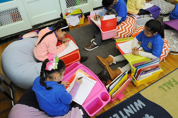 students using lap desks