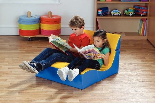 kids seating on soft double chair